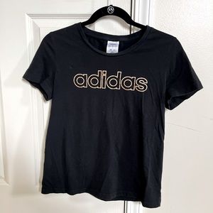 Adidas black short sleeve tee. Gold lettering. Size medium.